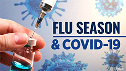 A syringe being filled before a graphic of virus cells and, 'FLU SEASON AND COVID-19'.